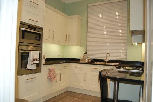 Auriol Road - After